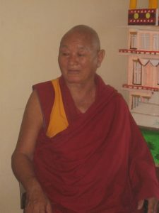 Mynavati with monks at the monastery