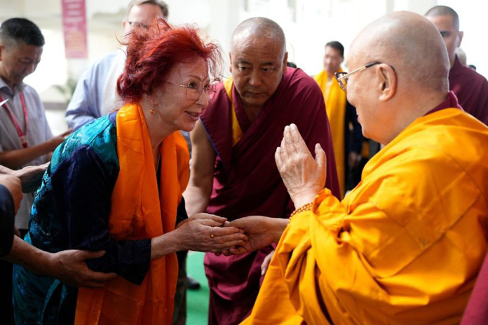 Mynavati receiving blessings from His Holiness the Dalai Lama